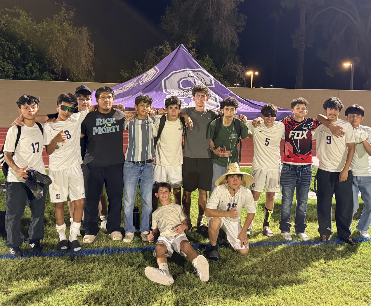 Sedona Soccer players gathered by the team tent